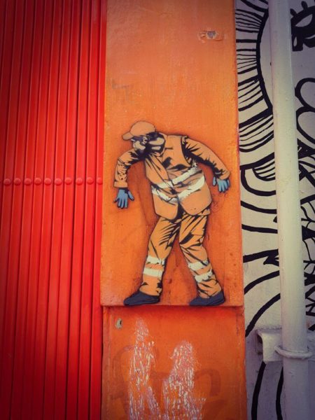 London Street Artist Jaune garbage man orange