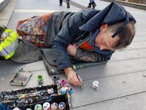 "Chewing Gum Man" Ben Wilson at work on Millennium Bridge