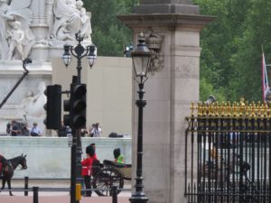 The Queen drives in an open carriage via "The Mall" up to "Buckingham Palace" where she will greet her people from the balcony